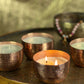 Ayurveda Duftkerze Pitta - Aqua Oud: Moodbild mit brennender Kerze und Mala Kette von Shiva Girl